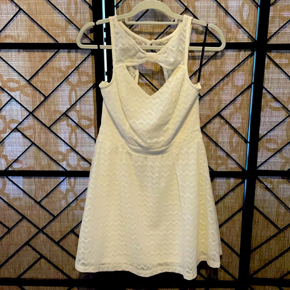 Material Girl beige cut out front/back dress. Size large. Brand new.